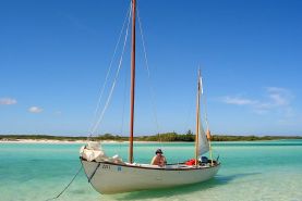 Drascombe Longboat Sailing Boat in turquoise seas